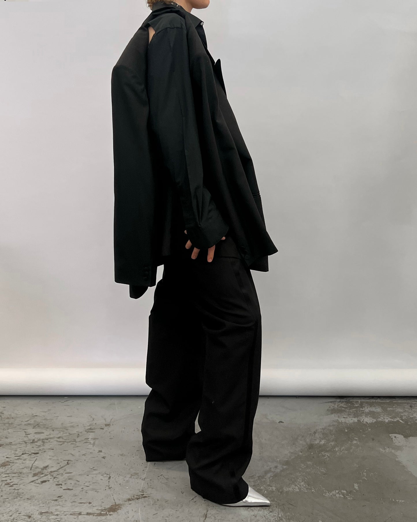 Blazer with hole in the back.