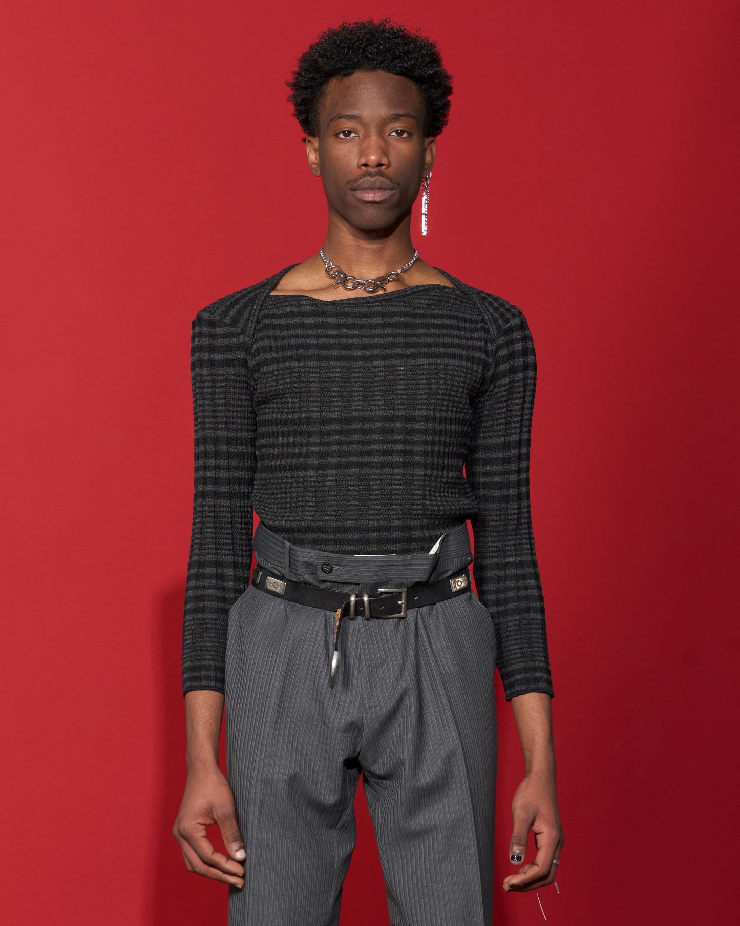 Black and Grey Checkered Sweater with Boat Neckline