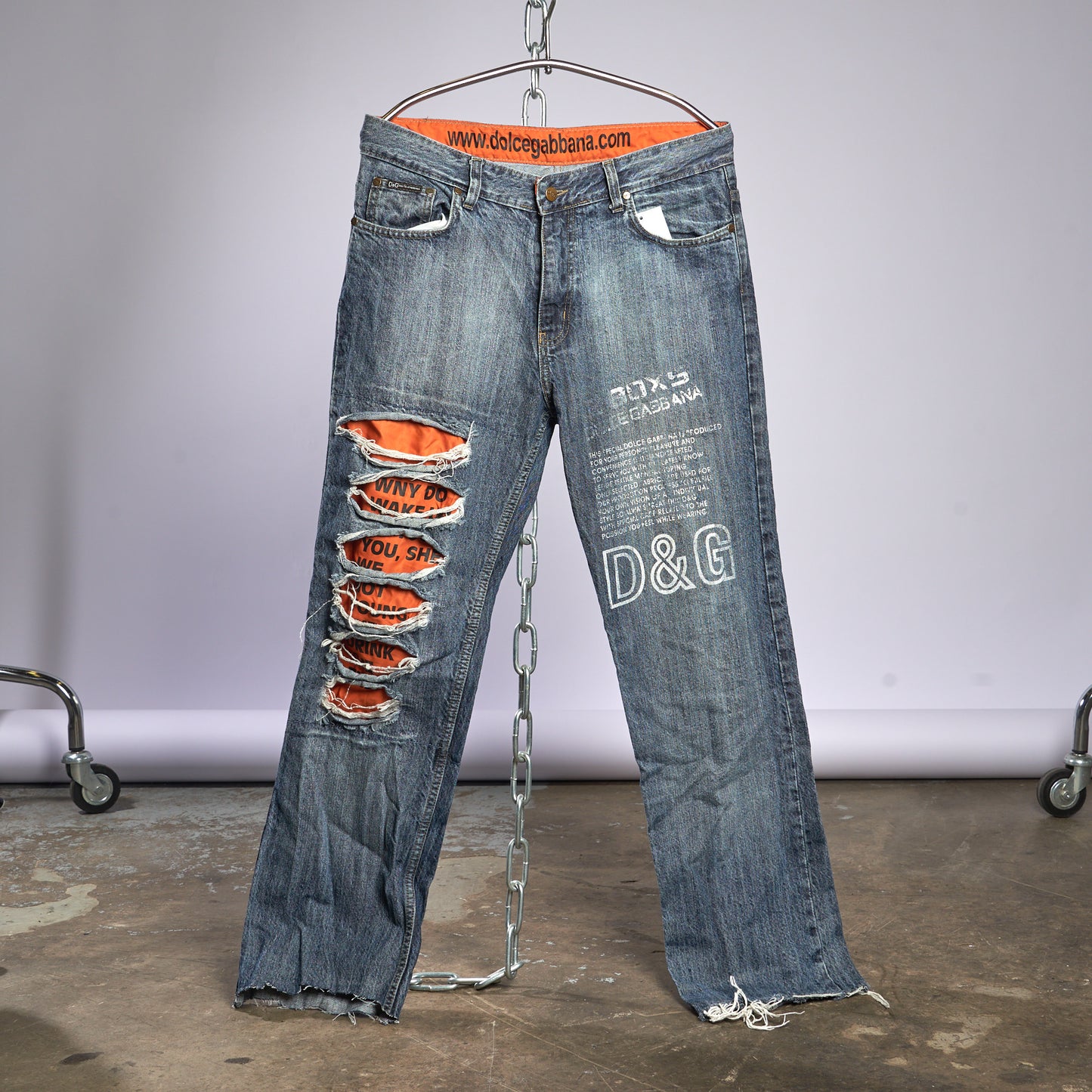 Designer Ripped Jeans with Orange Liner